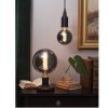 Miljöbild på lampfot i svart trä, här kombinerad med lampupphäng i samma serie JoJo. Snygg dekorationslampa för fönster eller by