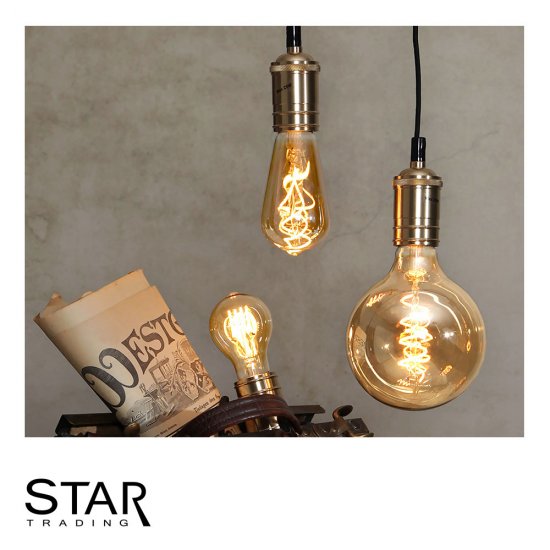 2W LED-lampa E27 TA60 Amber Spiral Filament Ø6 cm miljöbild